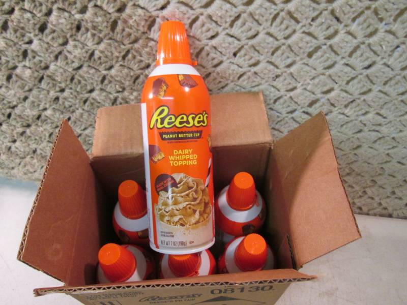 lot 221 image: Case of 6 Cans of Reeses Peanut But...