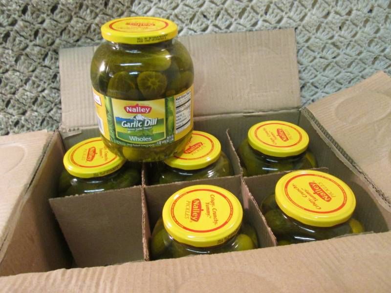 lot 227 image: Case of 6 Large Jars of Whole Garli...