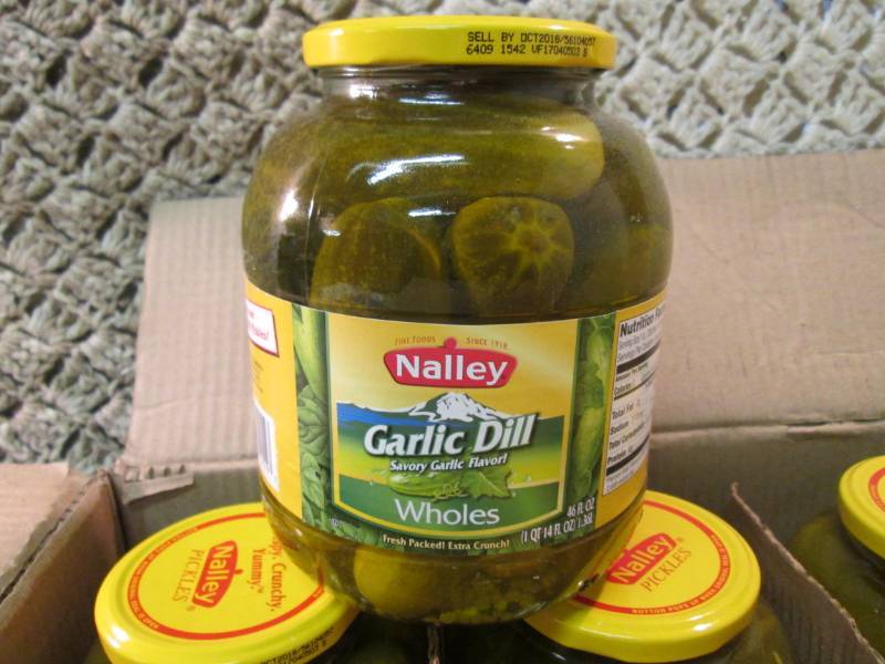 lot 228 image: Case of 6 Large Jars of Whole Garli...