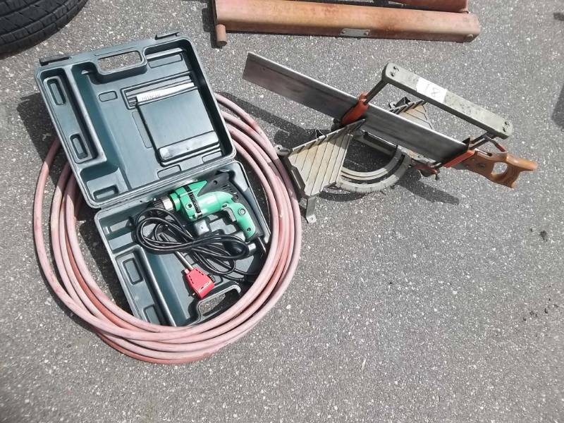 lot 18 image: Miter Box & Hitachi Corded Drill With Case, 50 Ft. Air Hose With Quick Connect Fittings