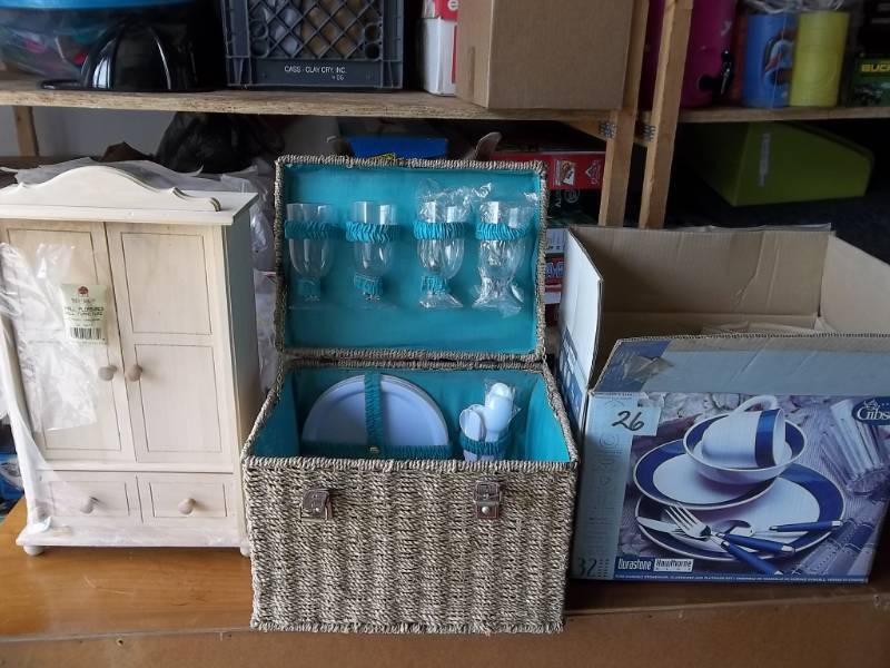 lot 26 image: Doll Armoire, Picnic Basket With Dishes, Box Of Partial New Dish Set