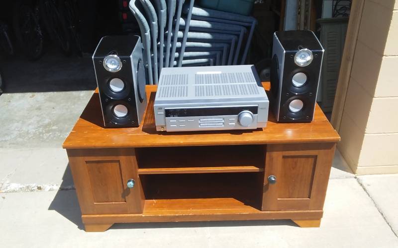 lot 38 image: TV Stand (41x22x20), JVC RX05022V AudioVideo Control Receiver, Pair Of Speakers