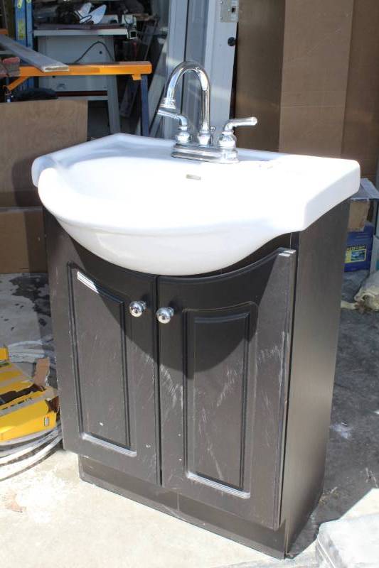 lot 54 image: Cabinet Sink with Faucet Fixtures