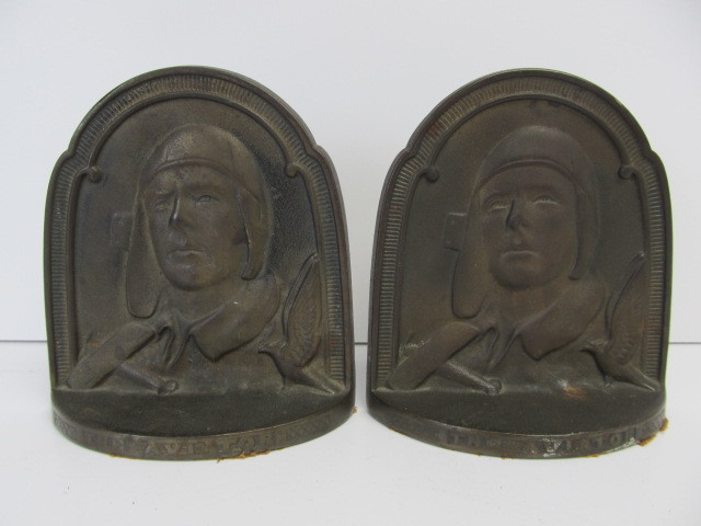 lot 223 image: Orig 1920s CHARLES LINDBERGH The Aviator Cast Bookends