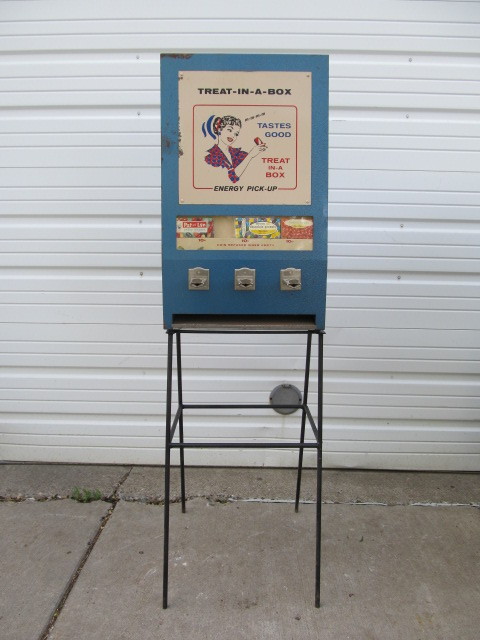 lot 180 image: Vintage TREAT-IN-A-BOX Coin Operated Vending Machine wOriginal Stand