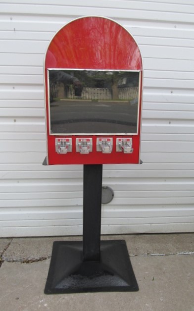 lot 181 image: Working Vintage Heavy 4-Slot Sticker Vending Machine
