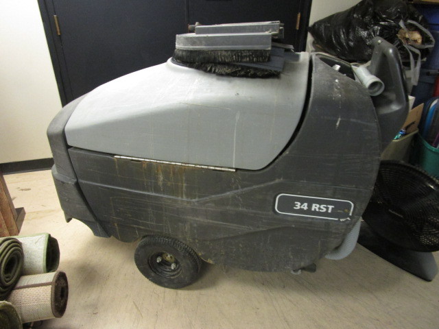 lot 210 image: ADVANCE FLOOR SCRUBBER
