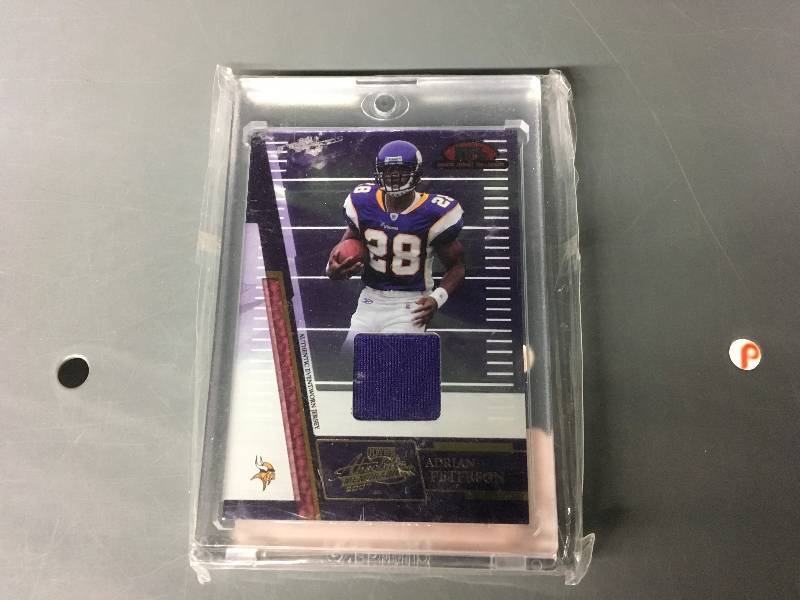 lot 487 image: Adrian Peterson Authentic Game Worn Jersey Card