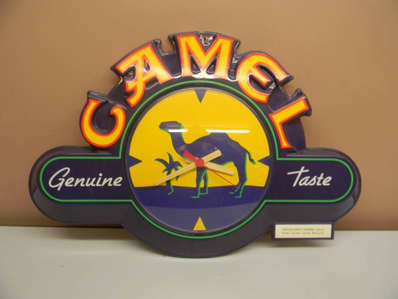 lot 10 image: LARGE VINTAGE CAMEL GENUINE TASTE CLOCK - WORKS - RARE - APPROX 29 BY 21 - SEE PICTURES