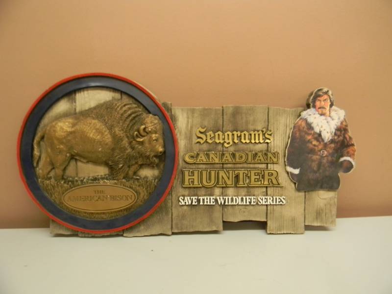 lot 47 image: VINTAGE SEAGRAMS CANADIAN HUNTER SAVE THE WILDLIFE SERIES THE AMERICAN BISON - VERY COOL MAN CAVE ITEM - APPROX 26 BY 13 - SEE PICTURES