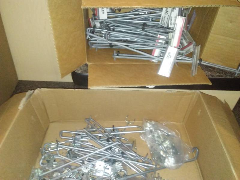 lot 9 image: Flip up Scanner hooks, 8 in with wall pegboard brackets.