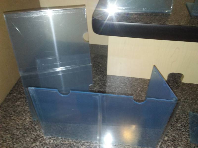 lot 10 image: Angled L-shaped acrylic sign holder - new
