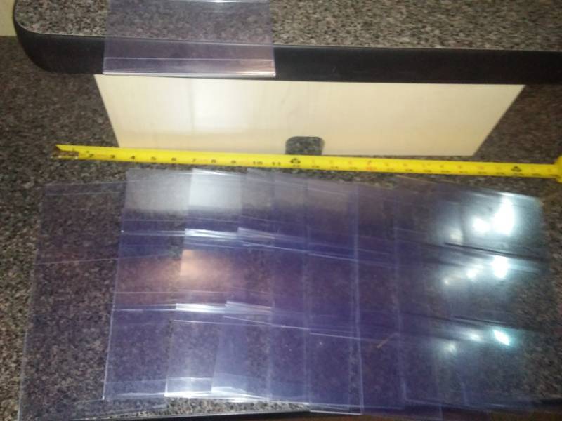 lot 21 image: Triple tier sign holder - 10. New in box.