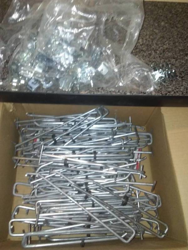 lot 28 image: Heavy duty pegboard hooks and bases - Approx. 50.