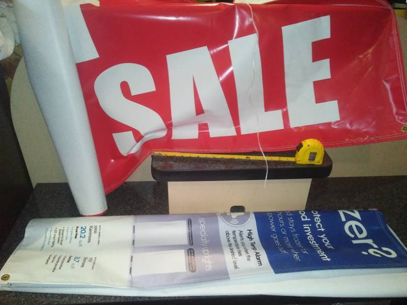 lot 32 image: 2 vinyl banners