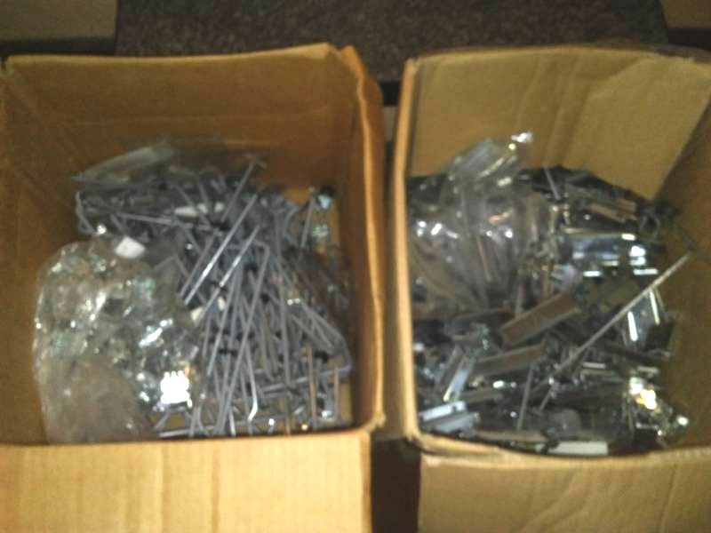 lot 37 image: Shelf brackets and pegboard hooks - dozens.