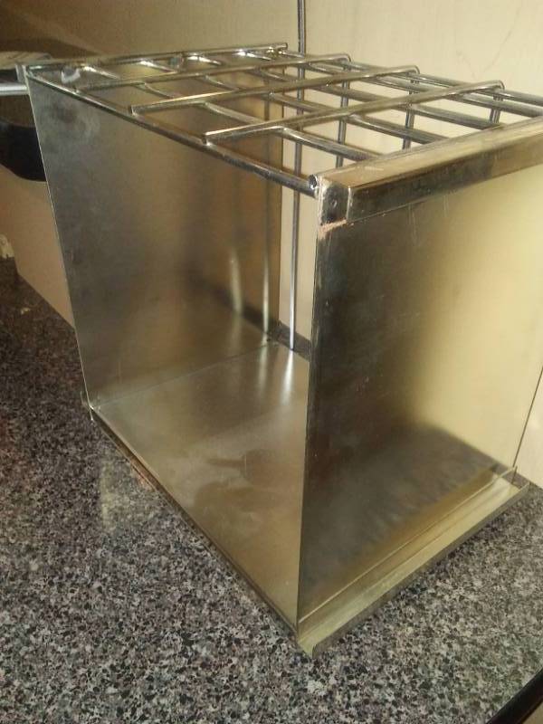 lot 51 image: Chrome hanging shelf.