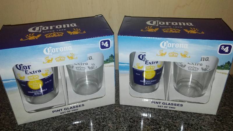 lot 65 image: 4 Corona pint glasses - new in box.
