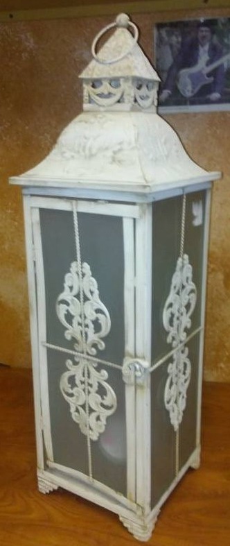 lot 100 image: Metal and Glass Candle Lantern.