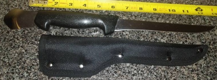 lot 95 image: Stainless fillet knife with nylon sheath.