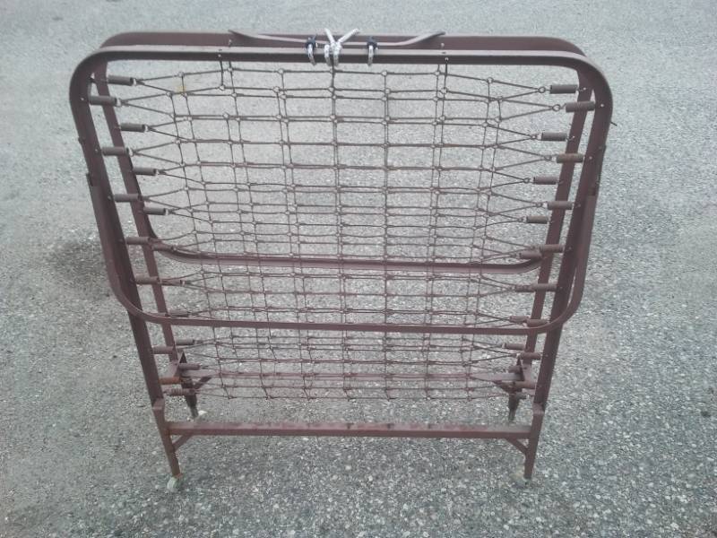 lot 114 image: Roll away frame on caster.