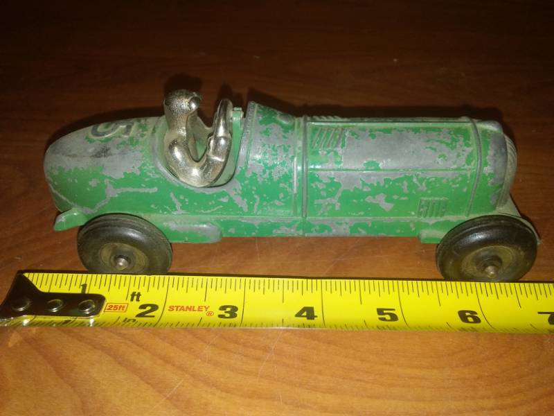 lot 129 image: Vintage Hubley Kiddie Toy Race Car & Driver.