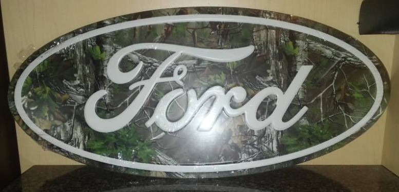 lot 139 image: Ford Oval Metal Sign Real Tree Camouflaged  NEW