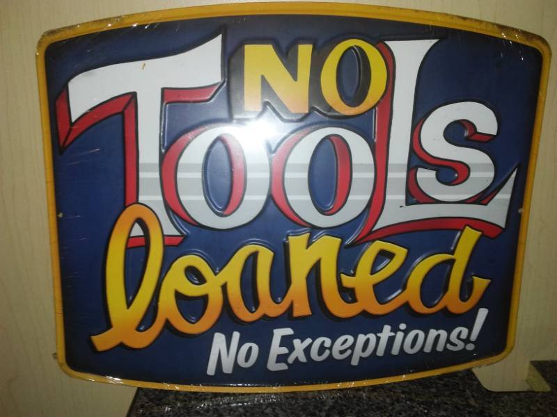 lot 147 image: No Tools Loaned Metal Sign  New.