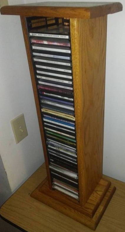 lot 179 image: Solid Oak CD Stand w CDs