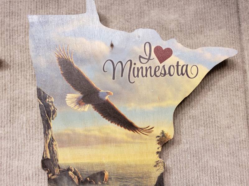 lot 157 image: (5) Kim Norlien Prints on Wood Minnesota, America, etc. w Sayings