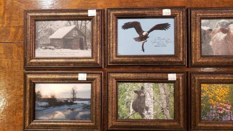 lot 163 image: (6) Kim Norlien Framed Photograph Table Top Prints with Stand