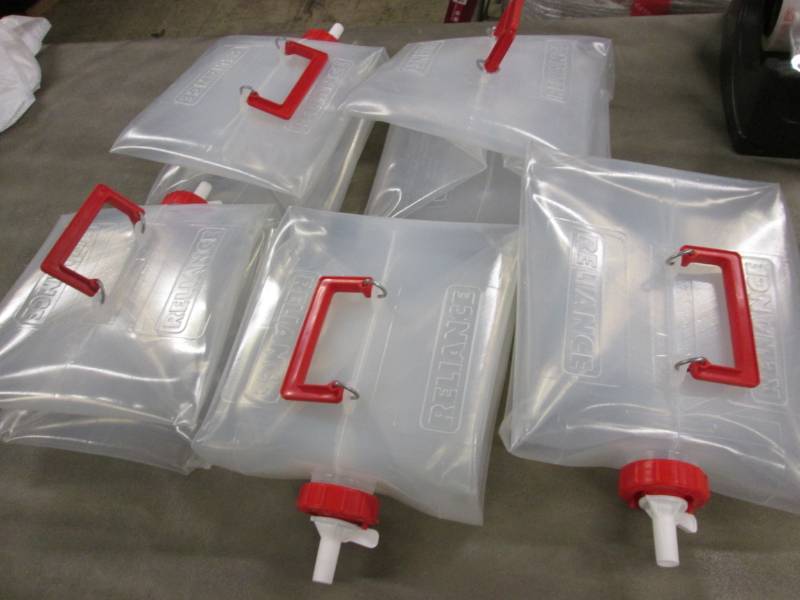 lot 27 image: Lot of 10 Reliance Fold-A-Carrier C...