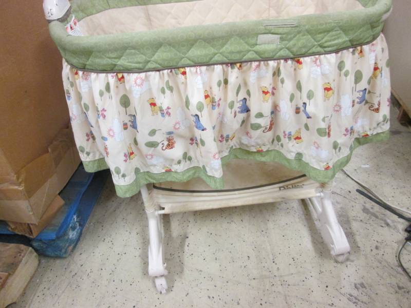 lot 181 image: Winnie the Pooh Bassinet- needs cle...
