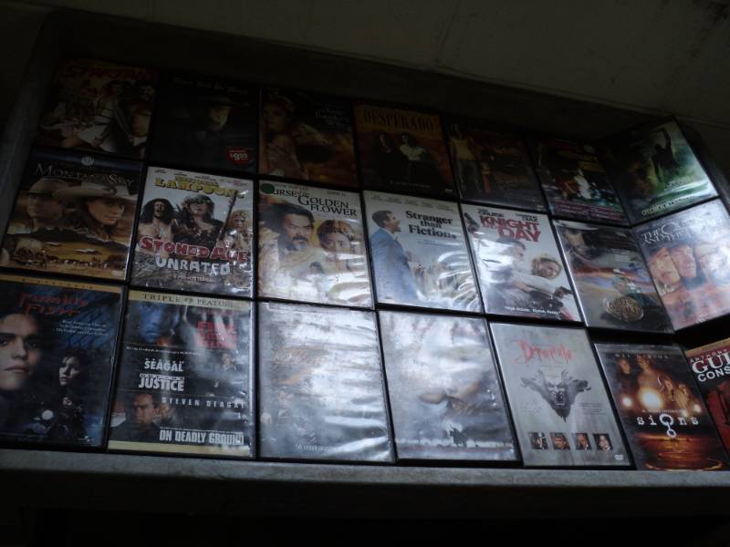 Lot of DVDs  and Glassware...
