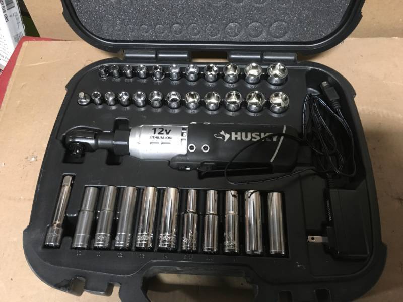 Husky 12-Volt Lithium-Ion 38 in. Drive Cordless Ratchet W 34 Piece Socket Set, Battery, Charger, and Carrying Case in good condition