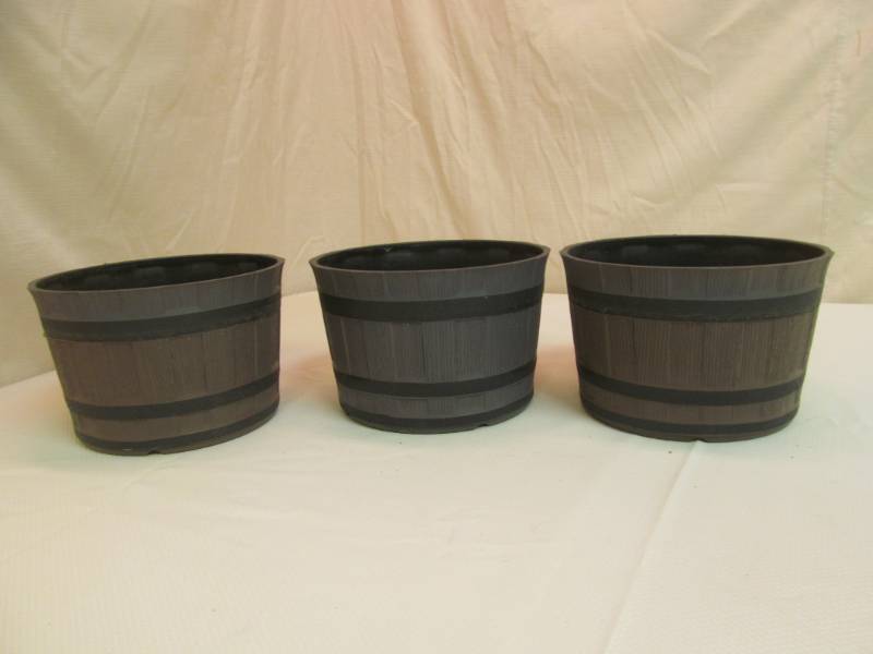 lot 5 image: whiskey barrel planters
