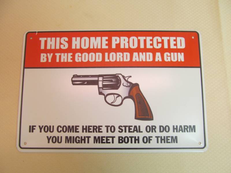 lot 120 image: tin sign