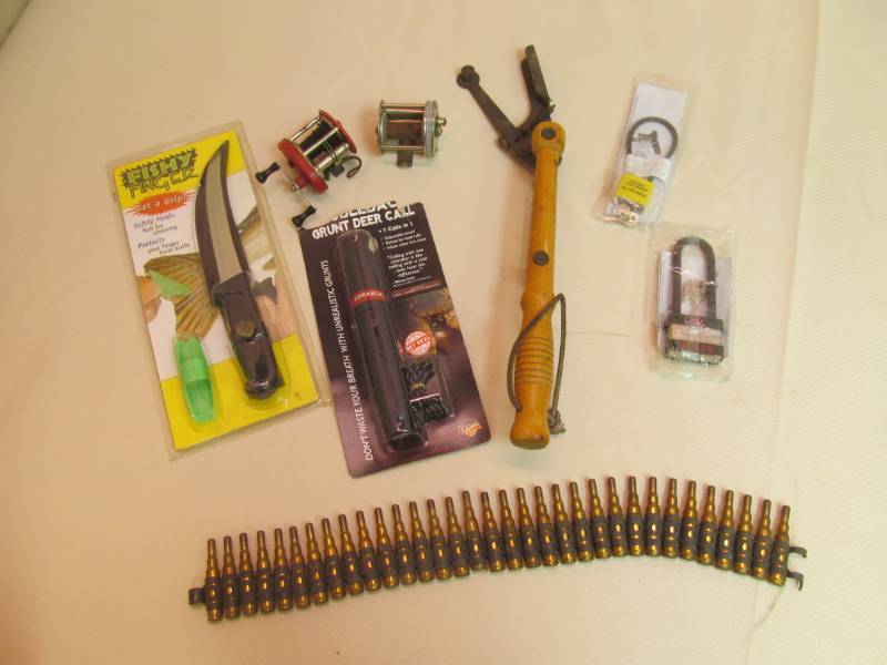 lot 160 image: Fishy Anglers Knife, Reels, Pigeon Clay Thrower, Ammo