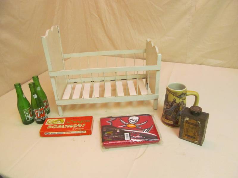 lot 208 image: Doll Crib, Dominos, Lunch bag, 7-up bottles, Vintage Stain can