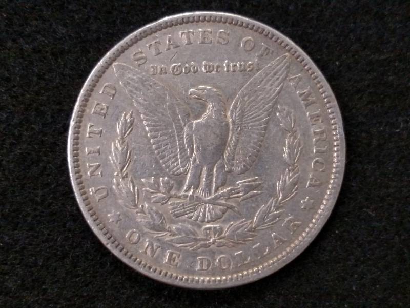 lot 16 image: 1884 Morgan Silver Dollar...