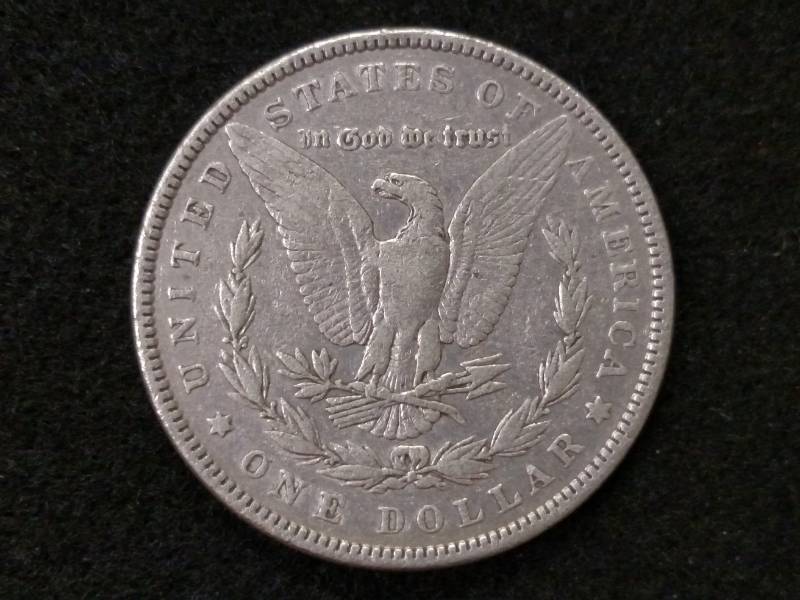 lot 18 image: 1885  Morgan Silver Dollar...