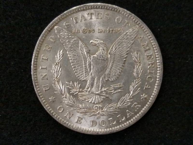 lot 19 image: 1885 O AU Morgan Silver Dollar ...