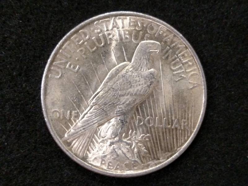 lot 49 image: 1922 Peace Silver Dollar...