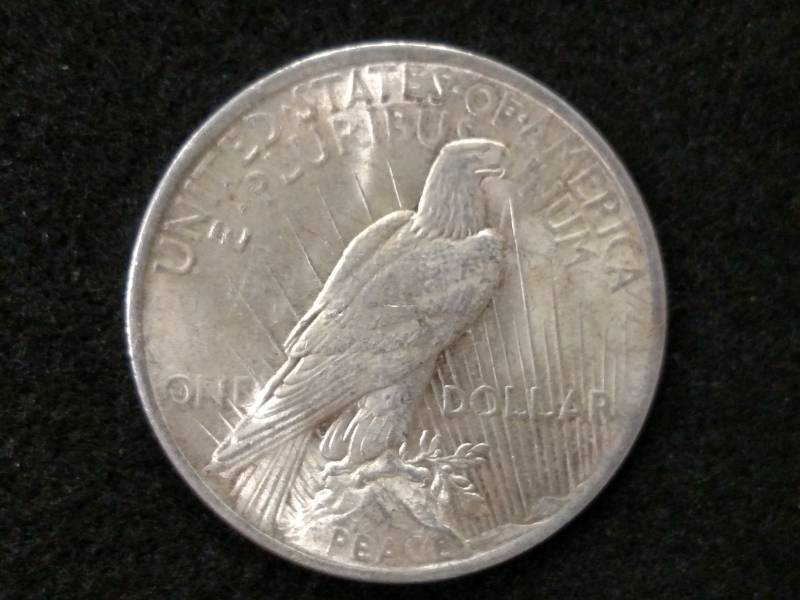 lot 52 image: 1922 Peace Silver Dollar...
