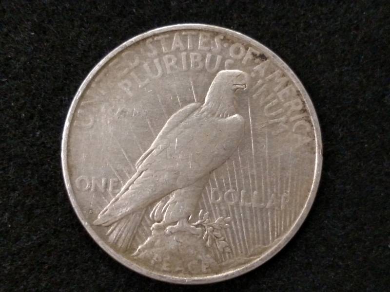 lot 53 image: 1922 D Peace Silver Dollar...