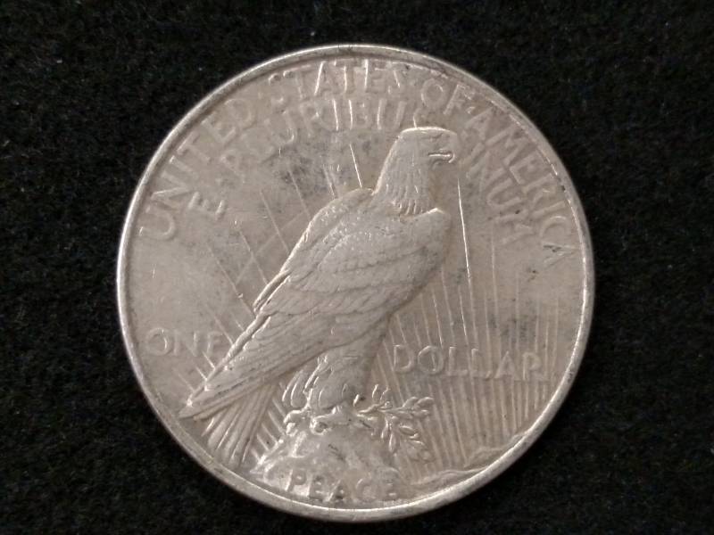 lot 55 image: 1923 Peace Silver Dollar...