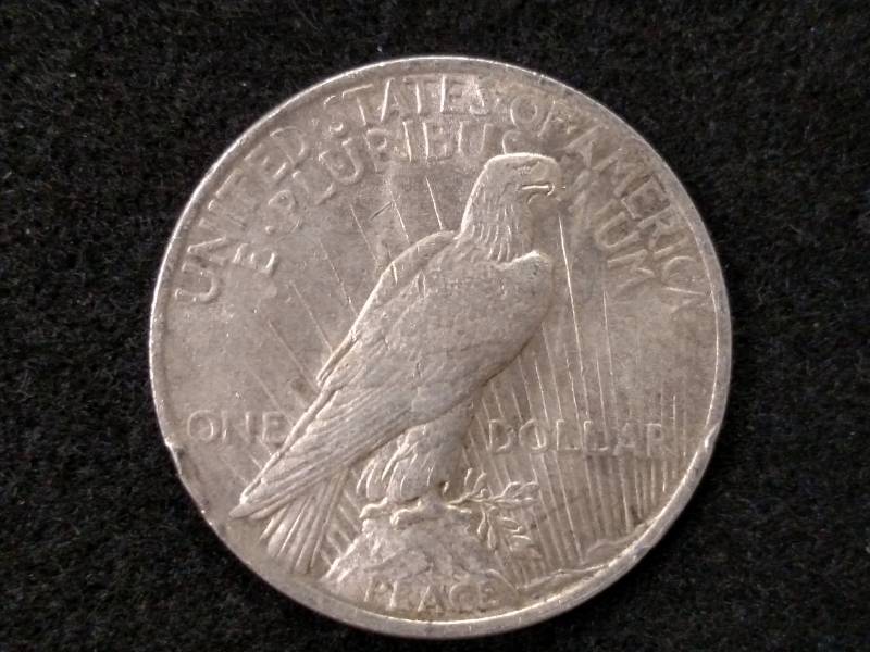 lot 56 image: 1923 Peace Silver Dollar...