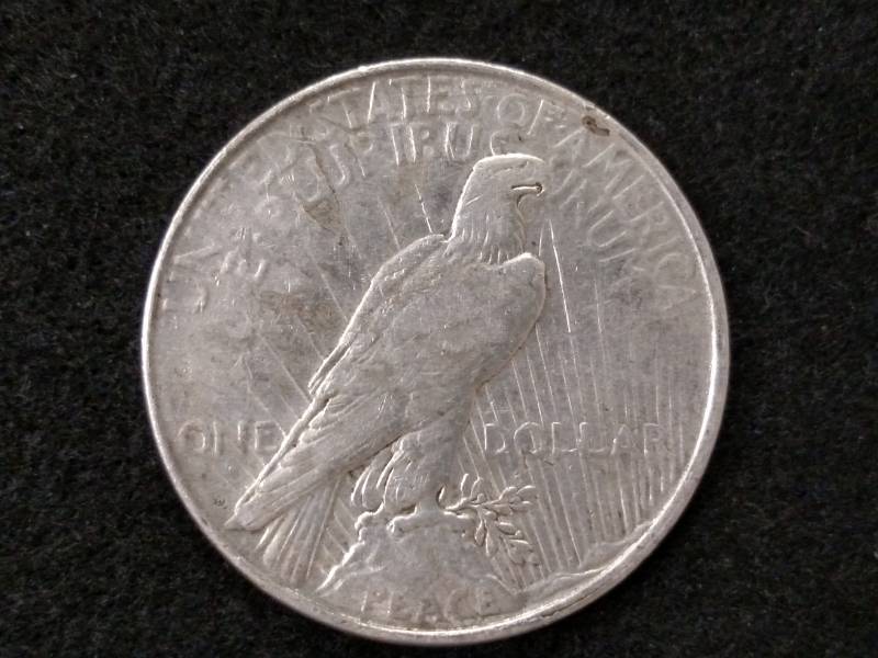 lot 57 image: 1923 D Peace Silver Dollar...