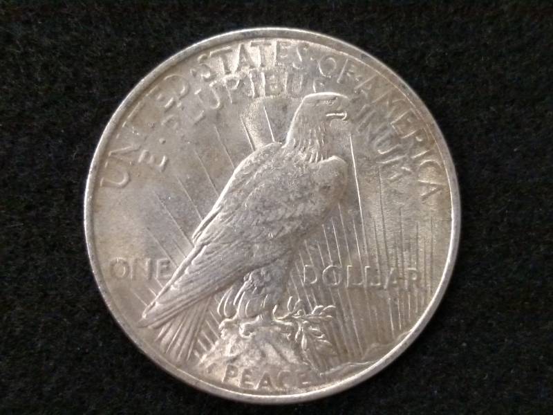 lot 62 image: 1924 Peace Silver Dollar...