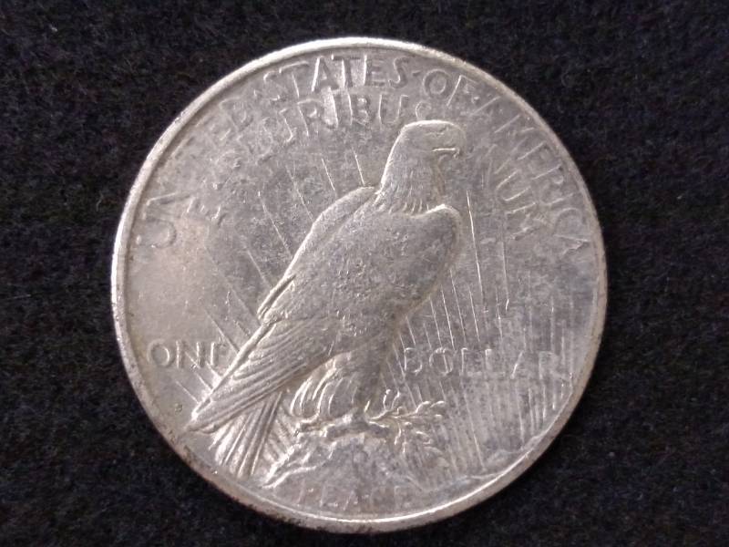 lot 64 image: 1924 S Peace Silver Dollar...